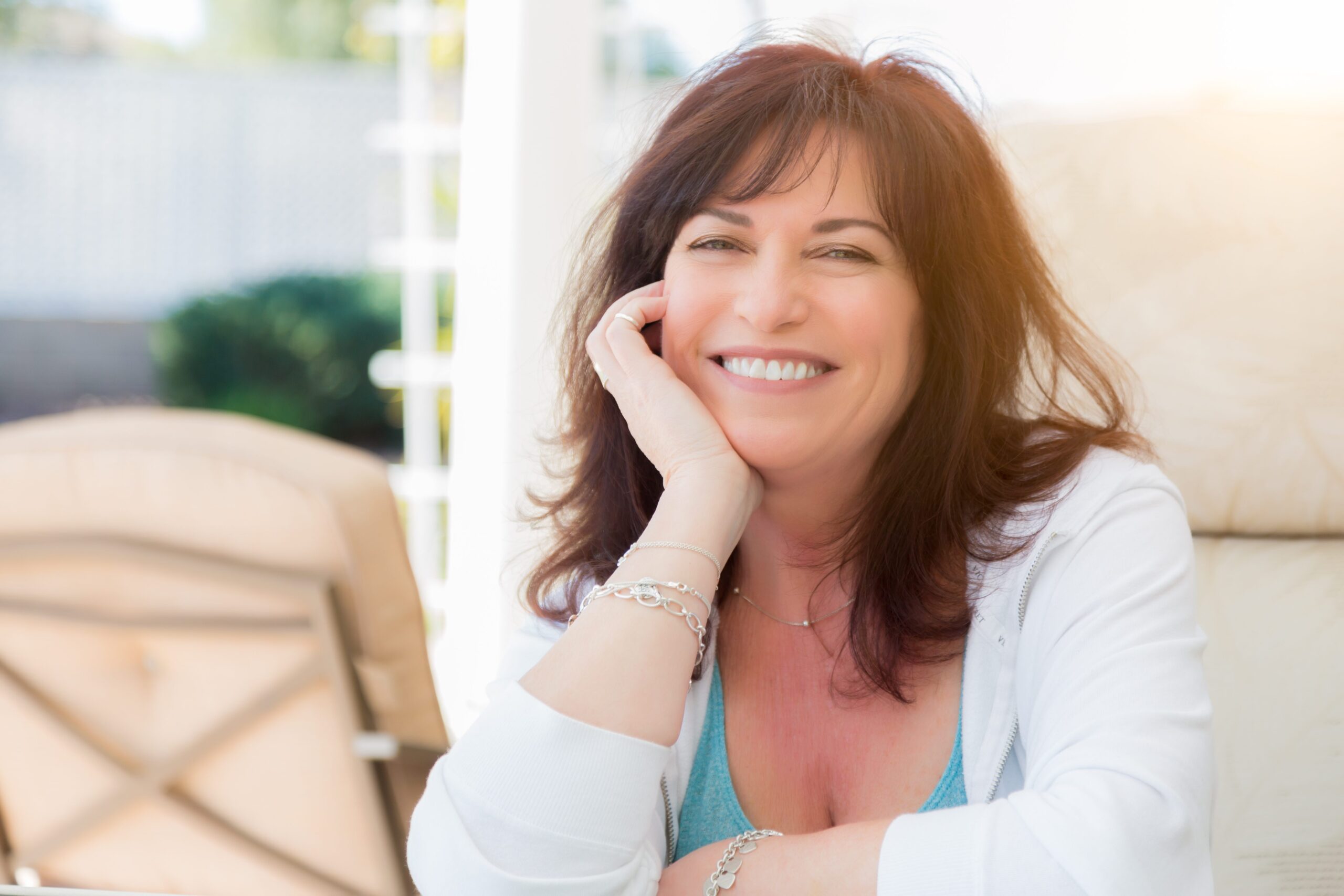 Happy woman in white shirt